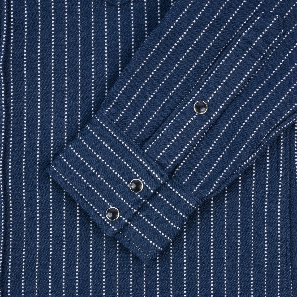 An Iron Heart chalk striped Western-style shirt with a collar, buttons, and front pockets laid out flat. IHSH-401-NAV