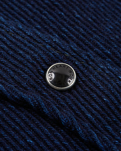 Close-up of a Iron Heart Indigo Kersey fabric shirt with 'Iron Heart' branding.